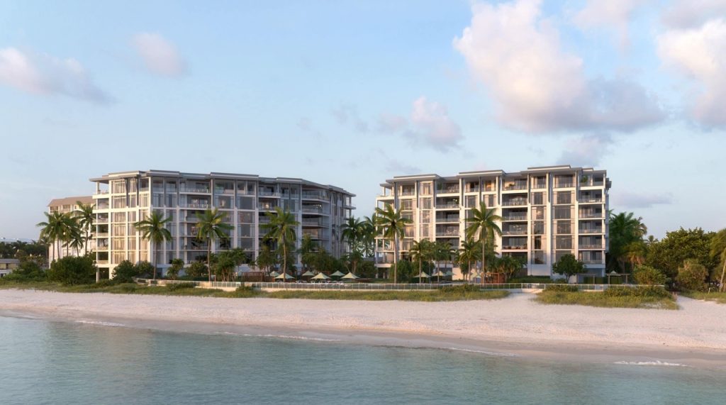 Aerial view of the construction site for Rosewood Residences Lido Key in Sarasota, Florida, located directly on the Gulf of Mexico with St. Armands Circle visible in the distance.