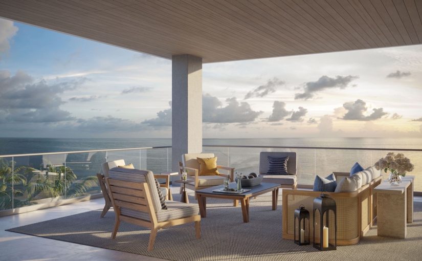 Luxury beachfront balcony at Rosewood Residences Naples Florida featuring sunset Gulf views, outdoor kitchen, and modern terrace design.
