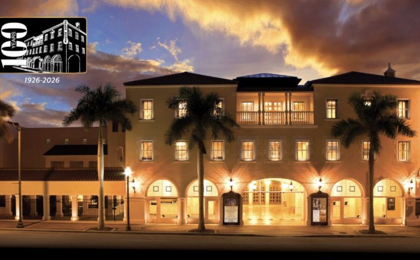The illuminated exterior of the Sarasota Opera House at sunset during its 100th-anniversary celebration (1926–2026).